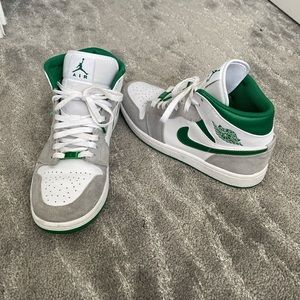 Green and white air Jordan’s